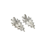 A pair of silver-toned heart-shaped earrings.